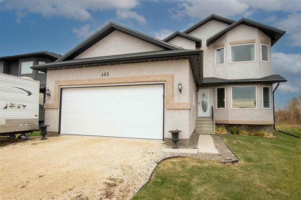 Recently sold home at 405 Notre Dame Drive, Lorette, MB R5K 0Y4, transacted by MIB Division at Royal LePage Prime